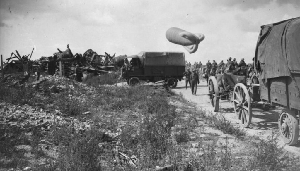 100_Canadian Artillery passing an Observation Balloon which is being brought down. Advance East of Arras. September, 1918. 2